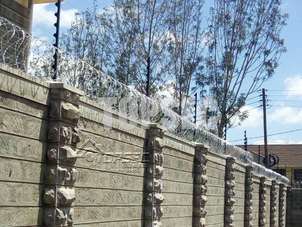 Topwall electric fencing